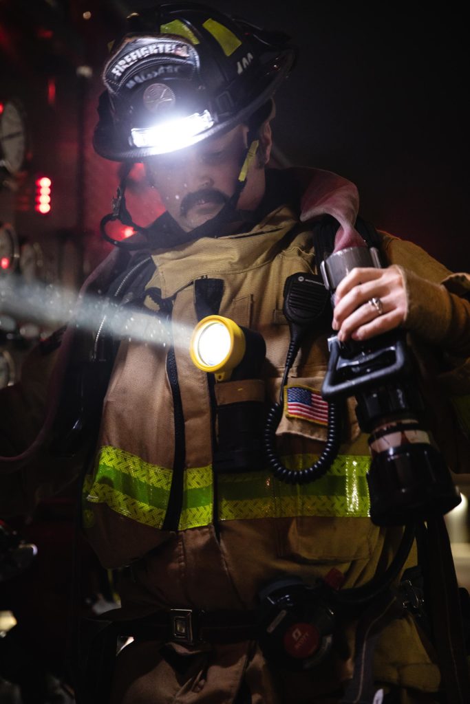 Firefighter with FoxFury BTS and Command+ helmet light