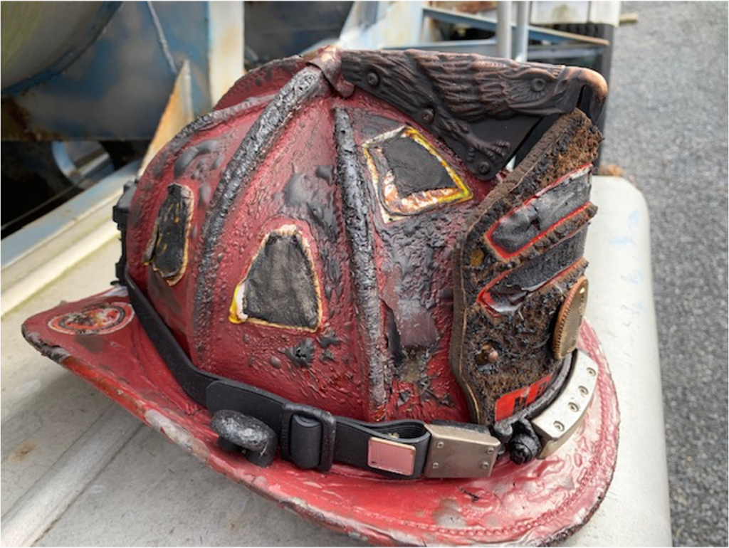 Leather helmet severely burned from flashover. FoxFury Discover still working 