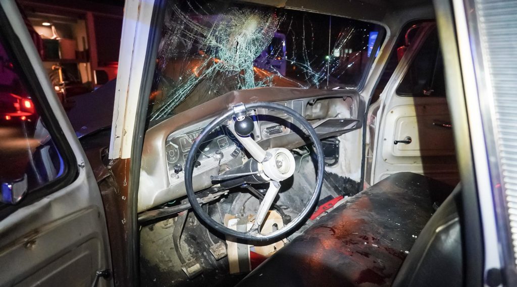 On camera FoxFury Rugo lights the interior of a wrecked truck for a traffic accident investigator