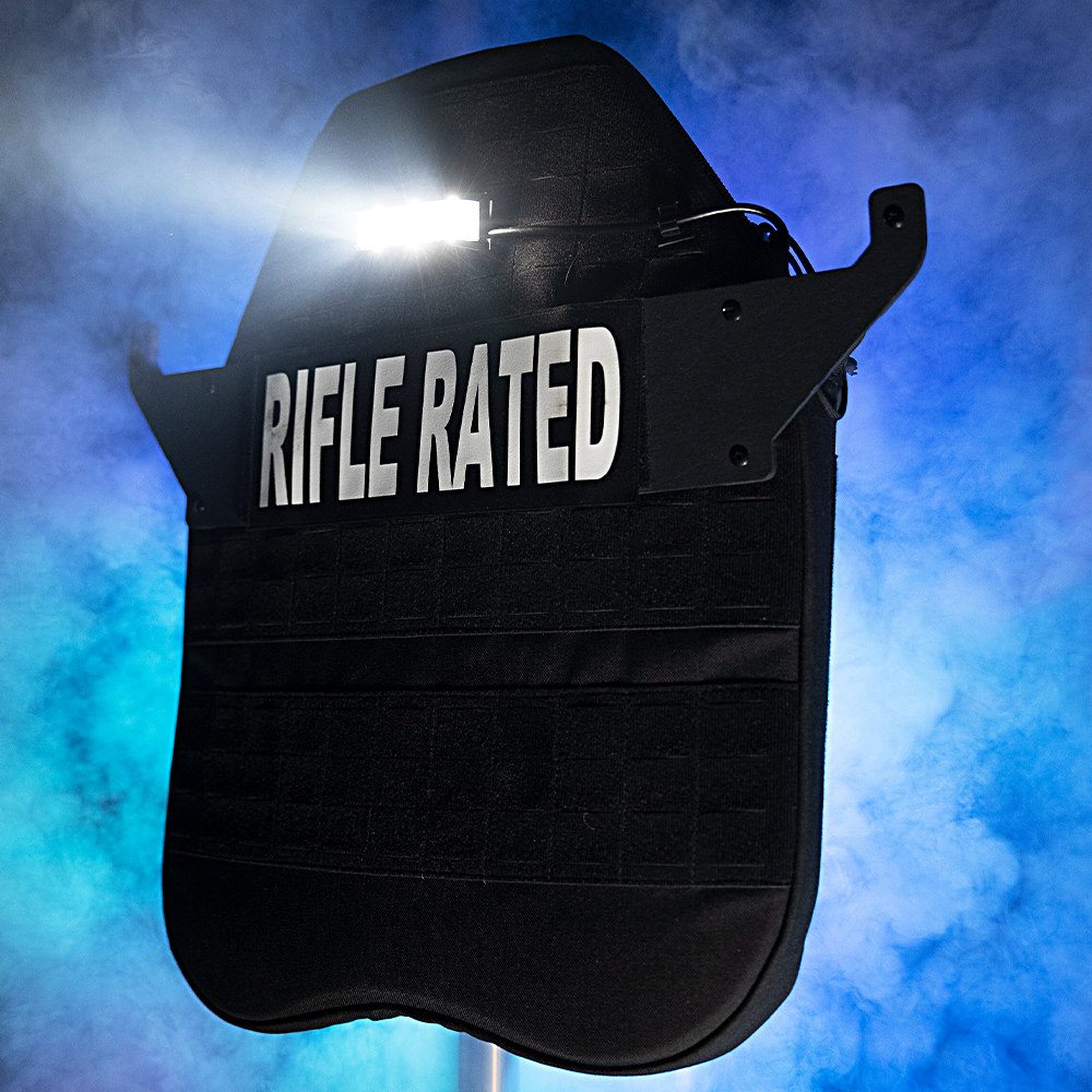 Taker B40 mounted on a curved ballistic shield